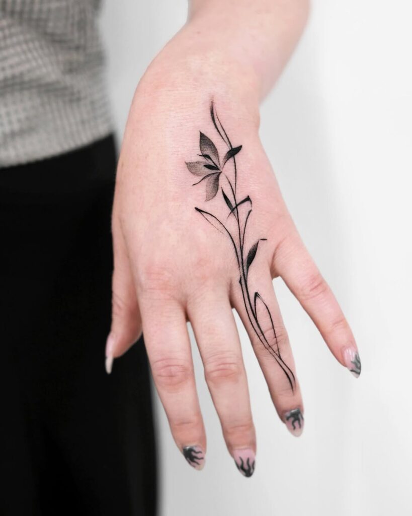 Flower Finger Tattoo