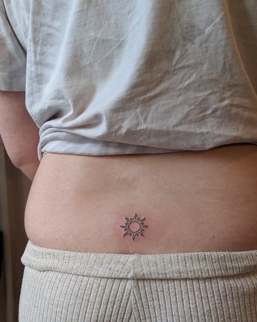 Lower Back Sun Tattoo