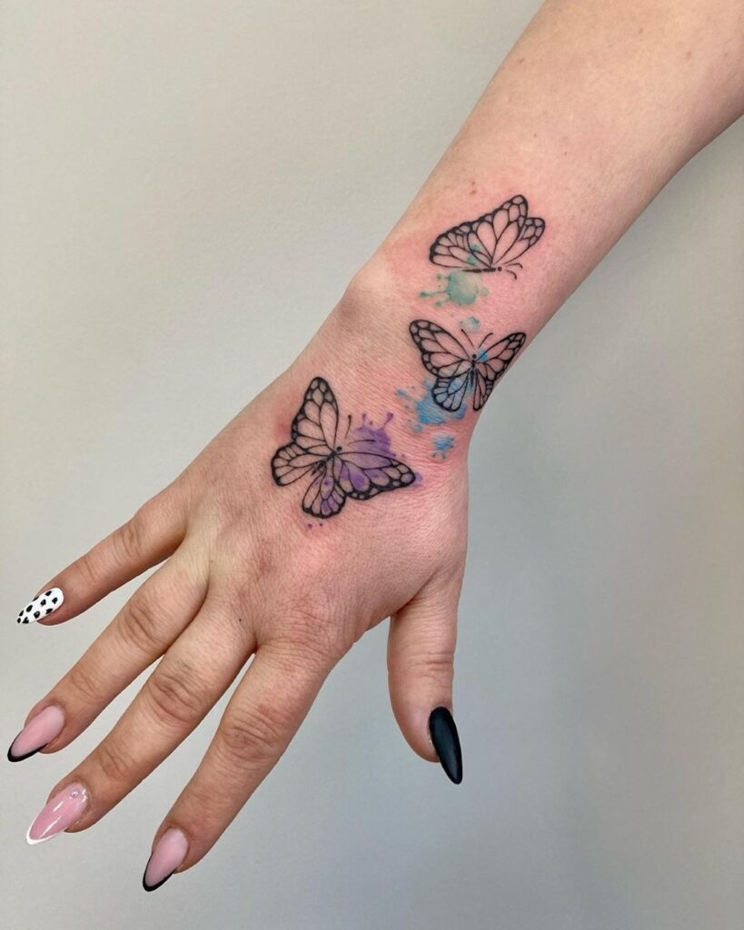 Butterflies Hand Tattoo