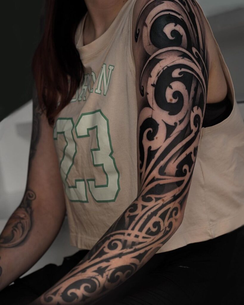Wavy Spiral Like Tattoo Sleeve