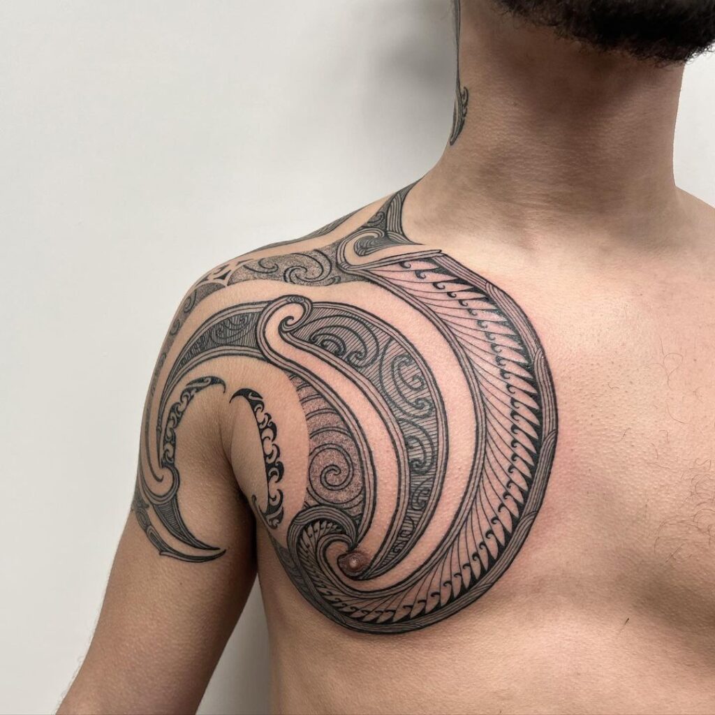 Half-Chest Tribal Tattoo