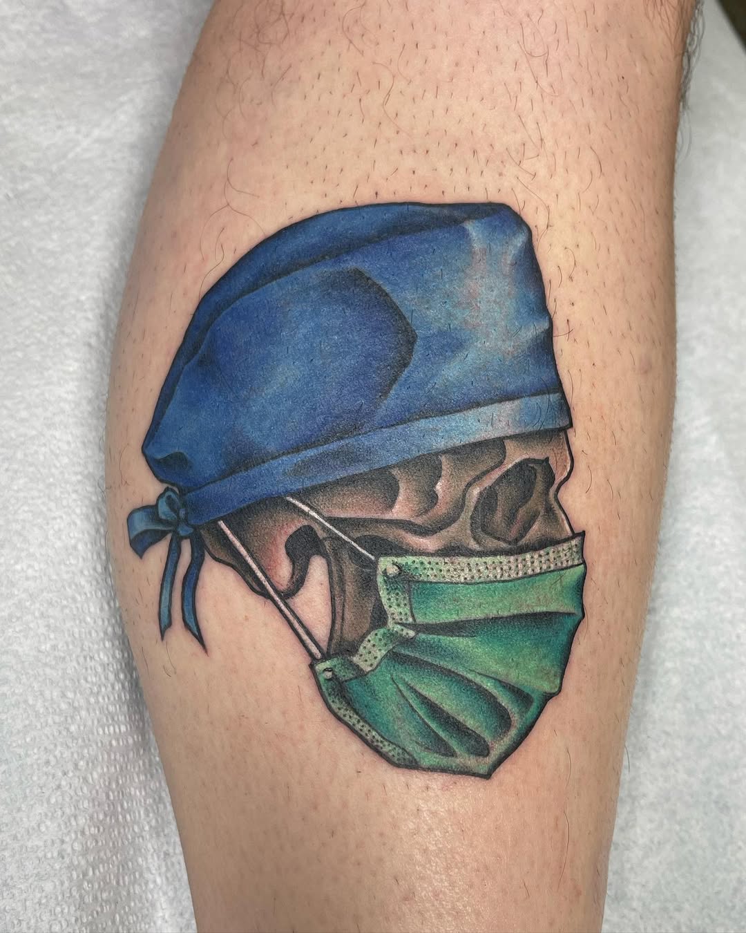 Realistic nurse tattoo with mask and cap