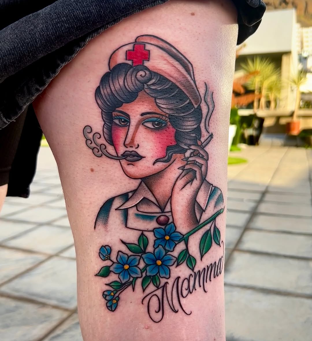 Stylish vintage nurse tattoo with a twist