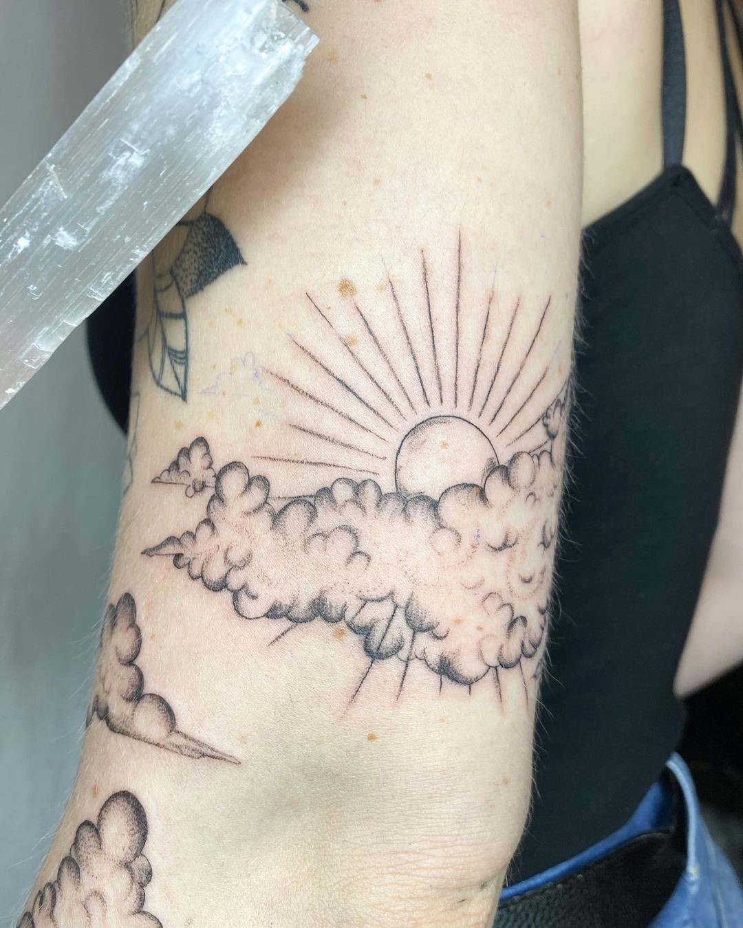 Sun With Clouds Tattoo