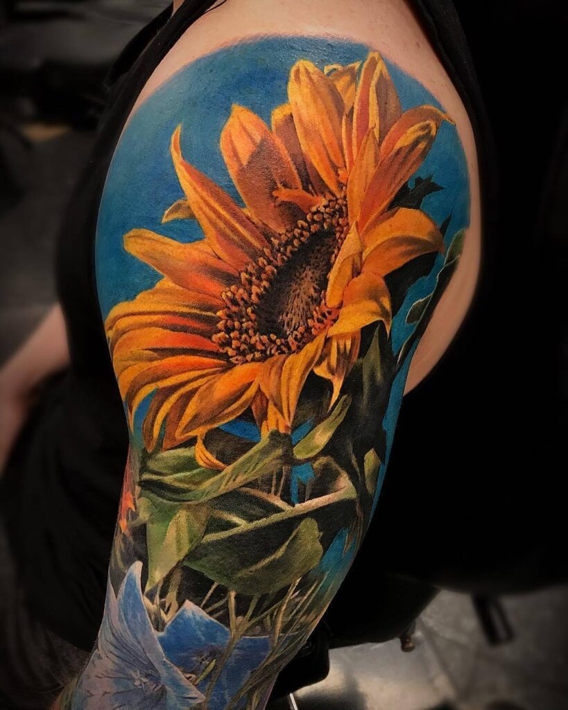 Vibrant And Realistic Sunflower Sleeve Tattoo
