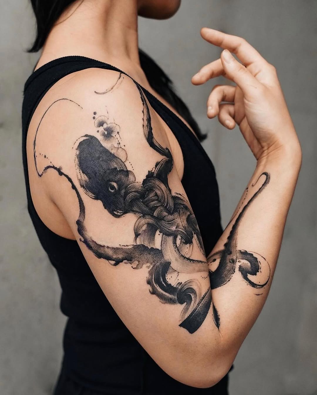 Elegant black ink octopus tattoo design