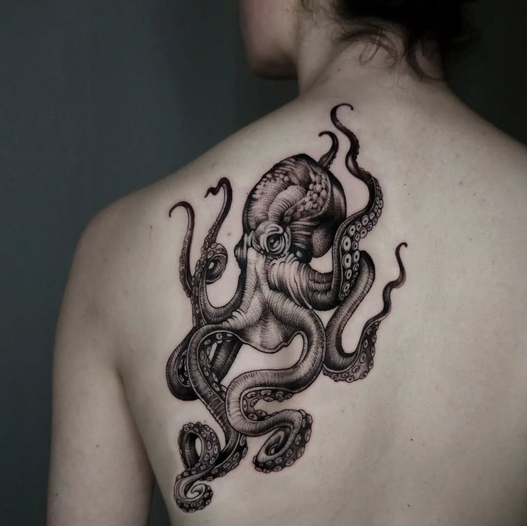 Intricate octopus tattoo on the back