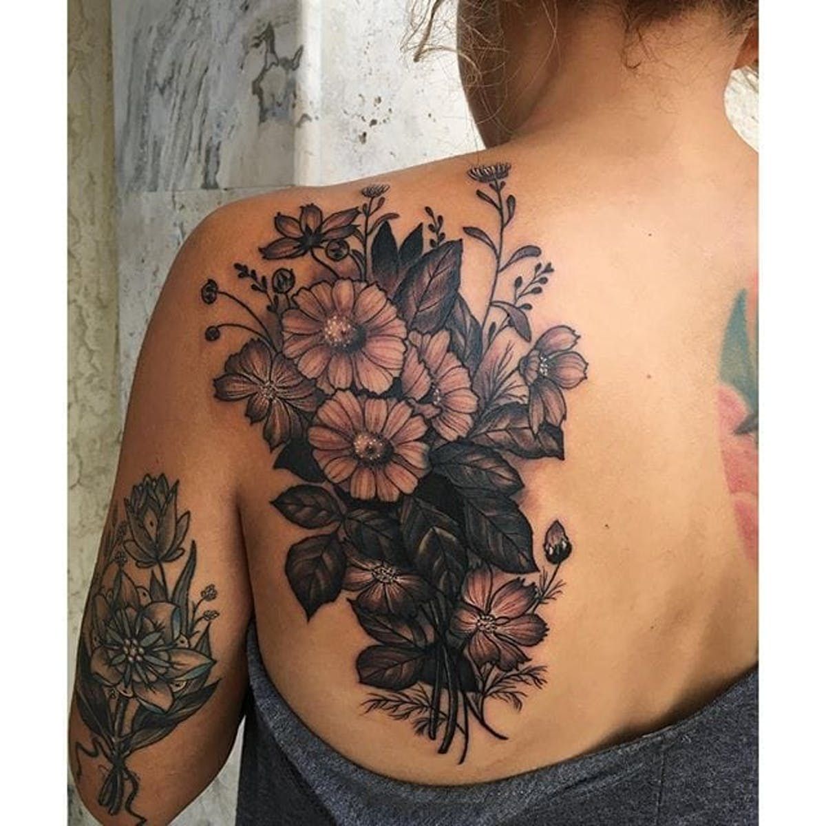 Botanical arrangement as nature-inspired tattoo cover up