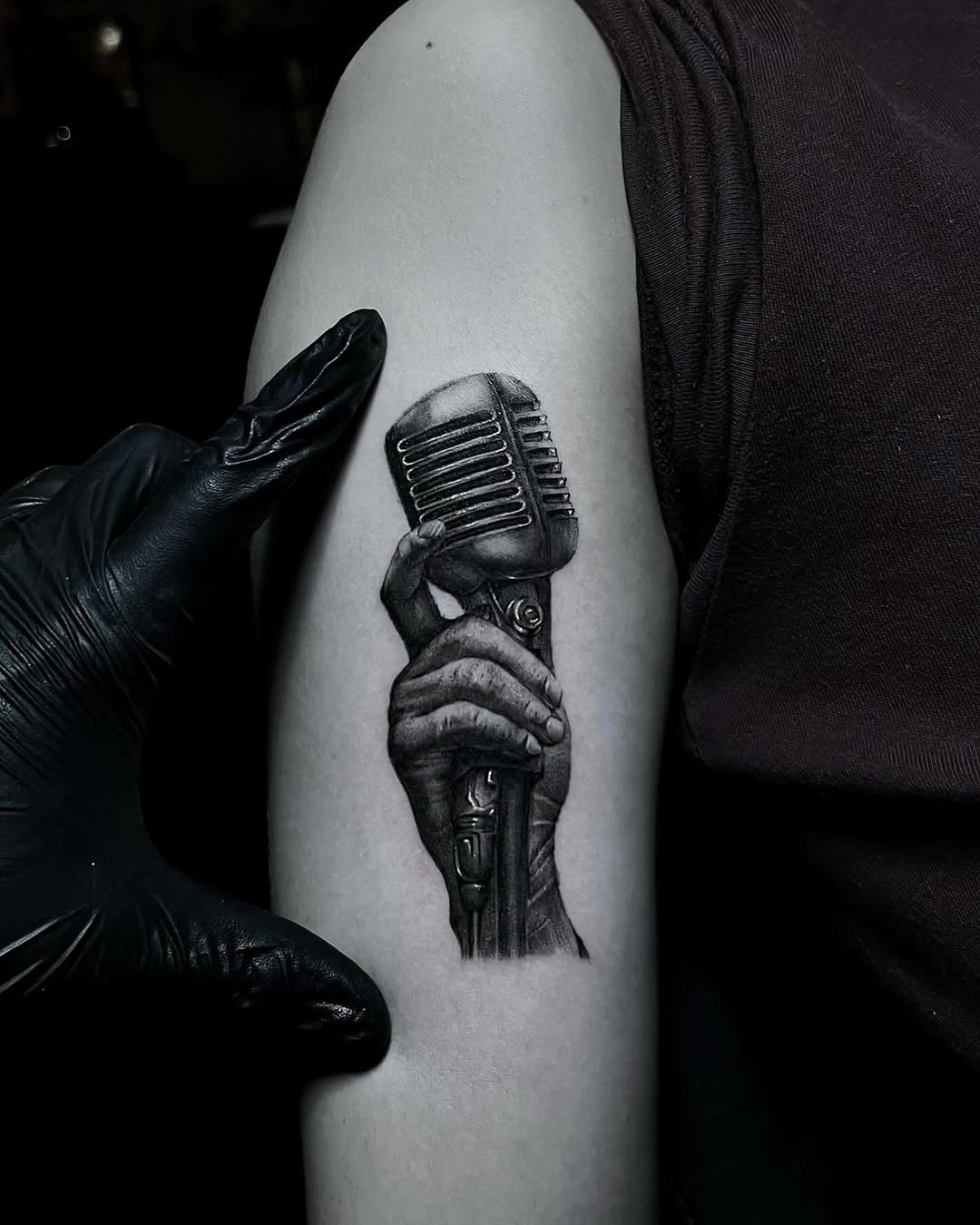 Stunning Microphone Tattoo with Realistic Hand