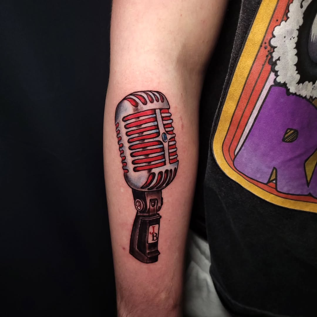 Vintage microphone tattoo with vibrant colors