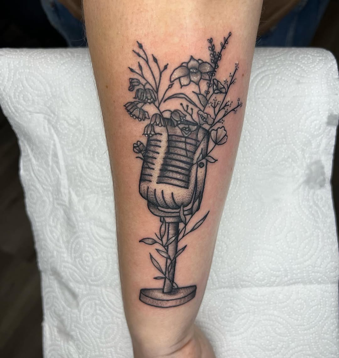 Stylish Microphone Tattoo with Floral Elements