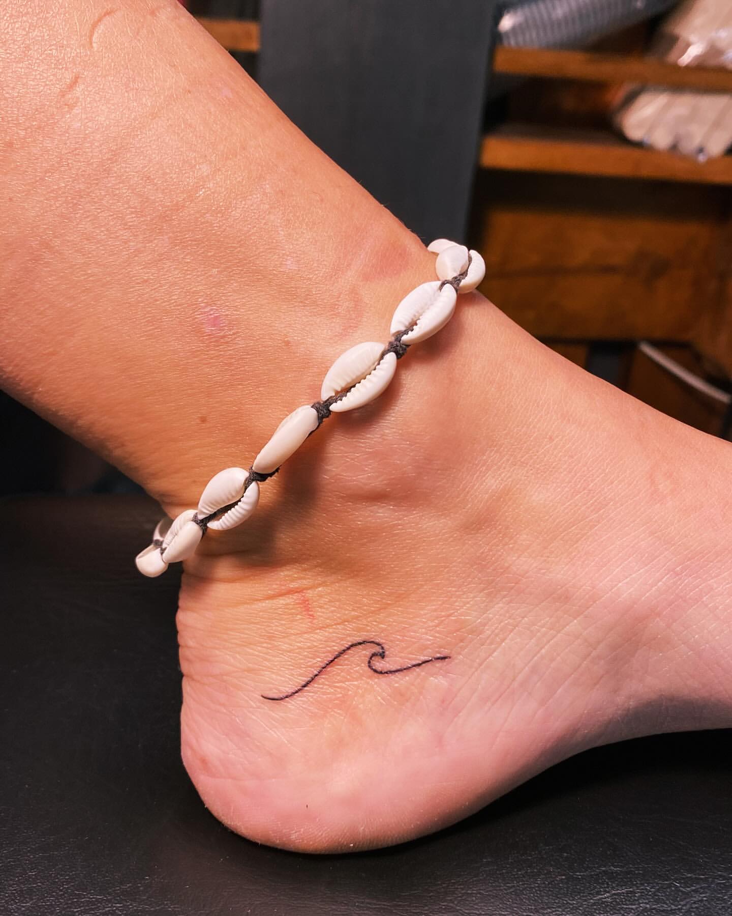 tiny wave tattoo