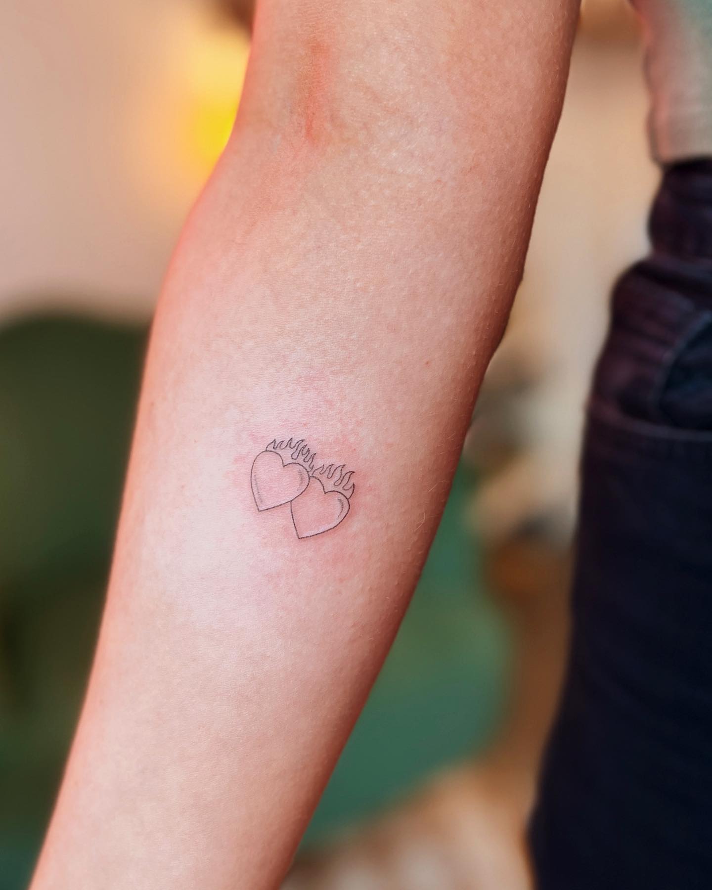burning hearts tattoo