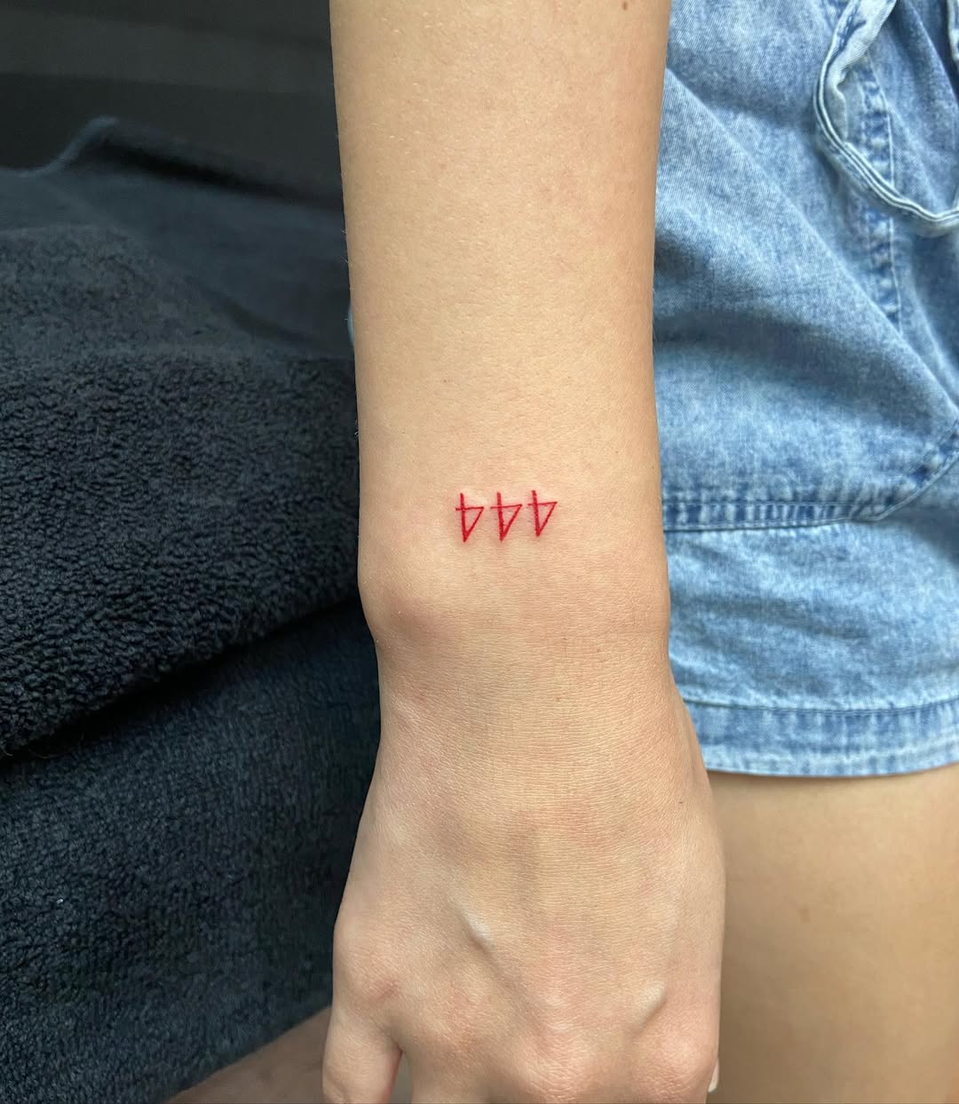 Minimalist 444 Tattoo in Bold Red Ink