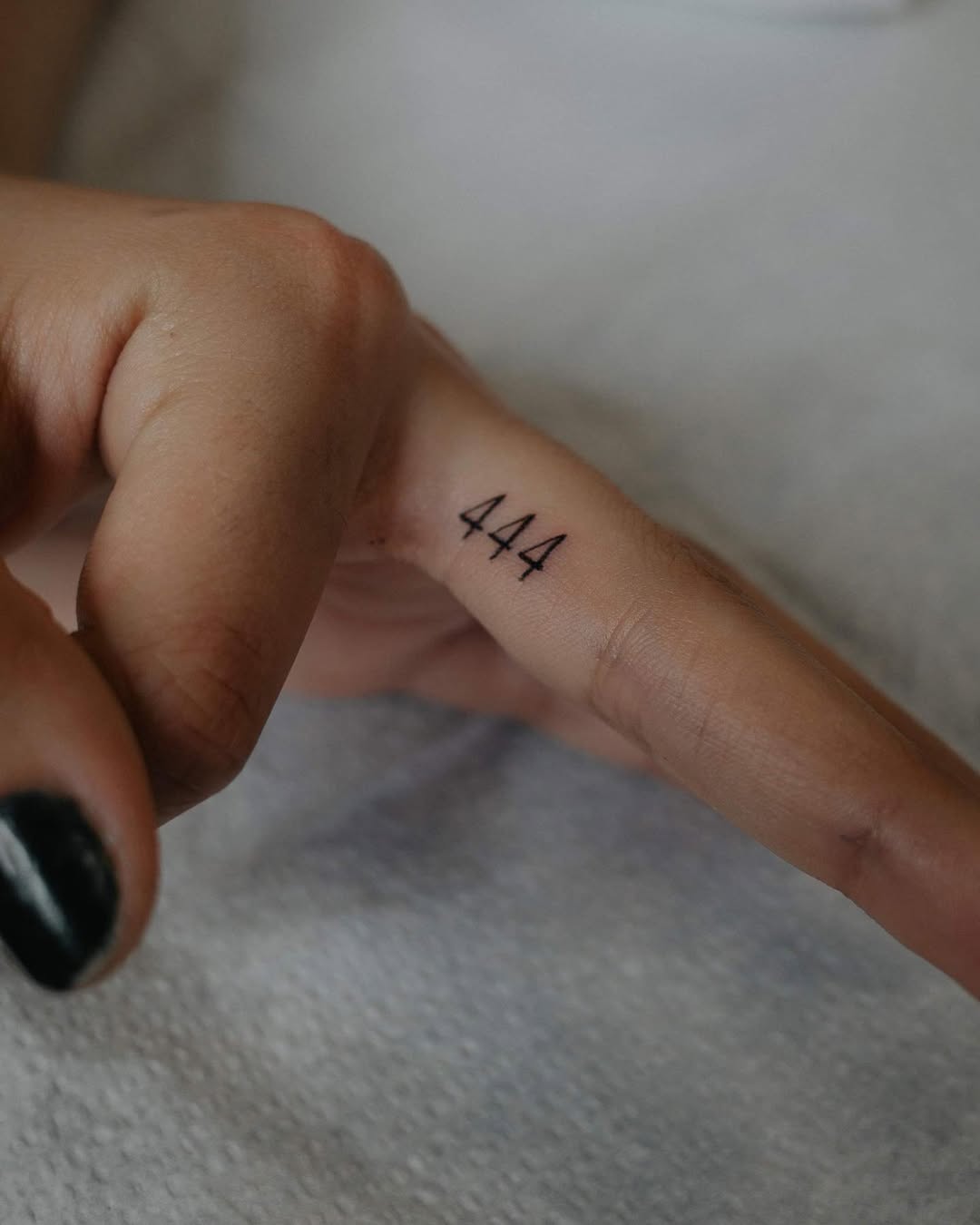 Minimalist 444 Tattoo on Finger