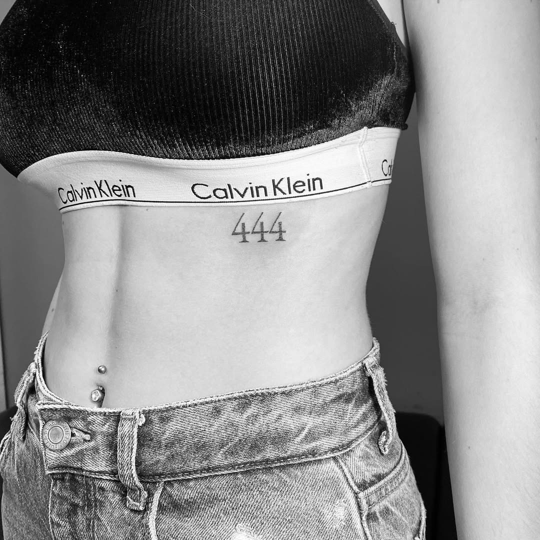 Stylish 444 tattoo in minimalistic black ink