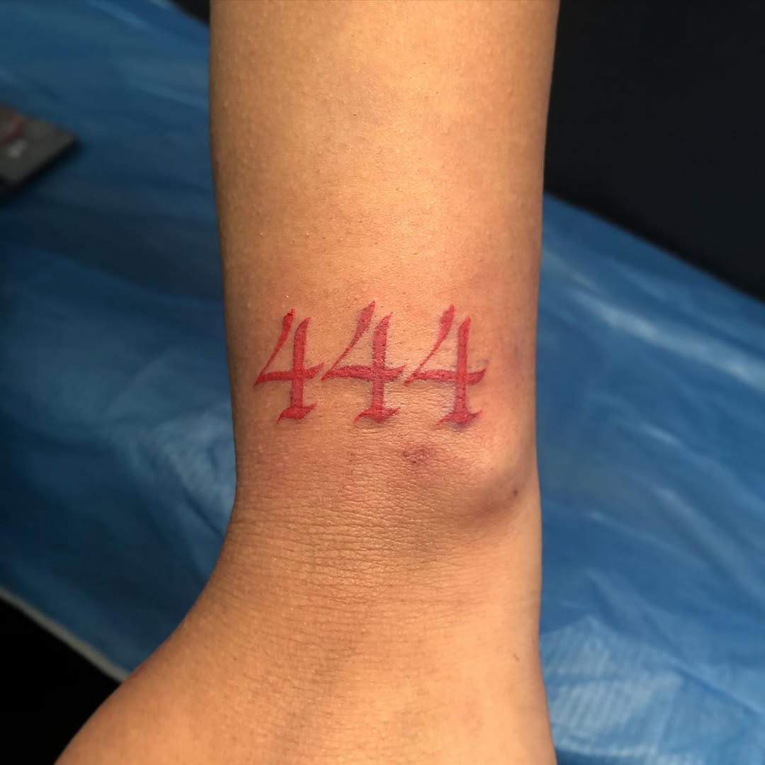 Minimalist 444 Tattoo in Vibrant Red Ink