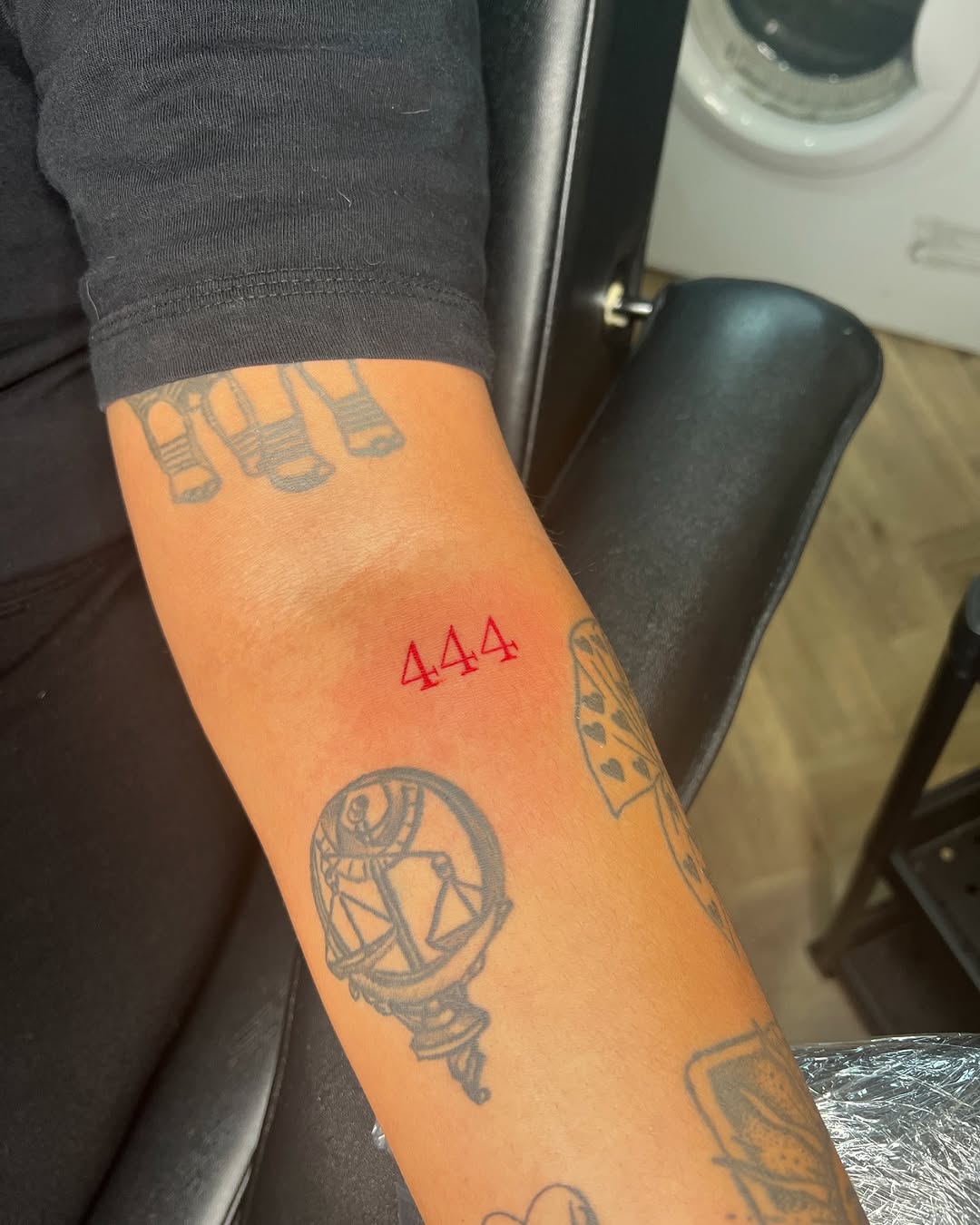 Minimalist 444 Tattoo in Bold Red Ink