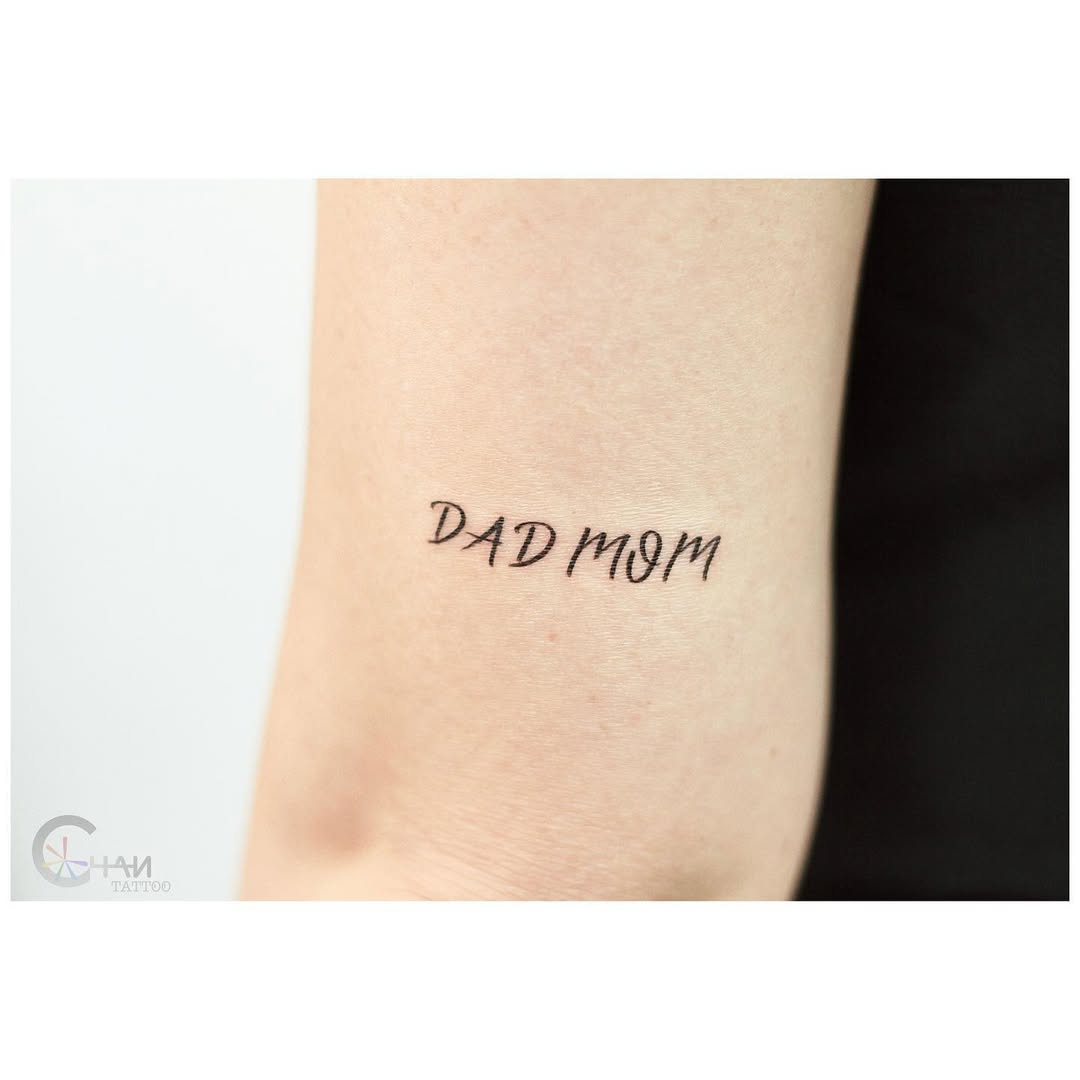 Stylish dad and mom tattoo design