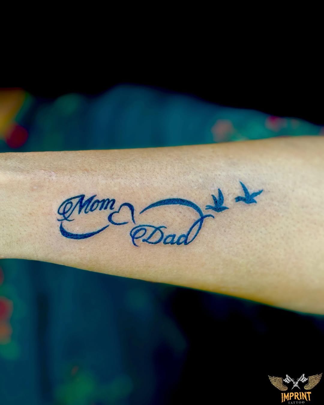 Beautiful mom and dad tattoo with birds