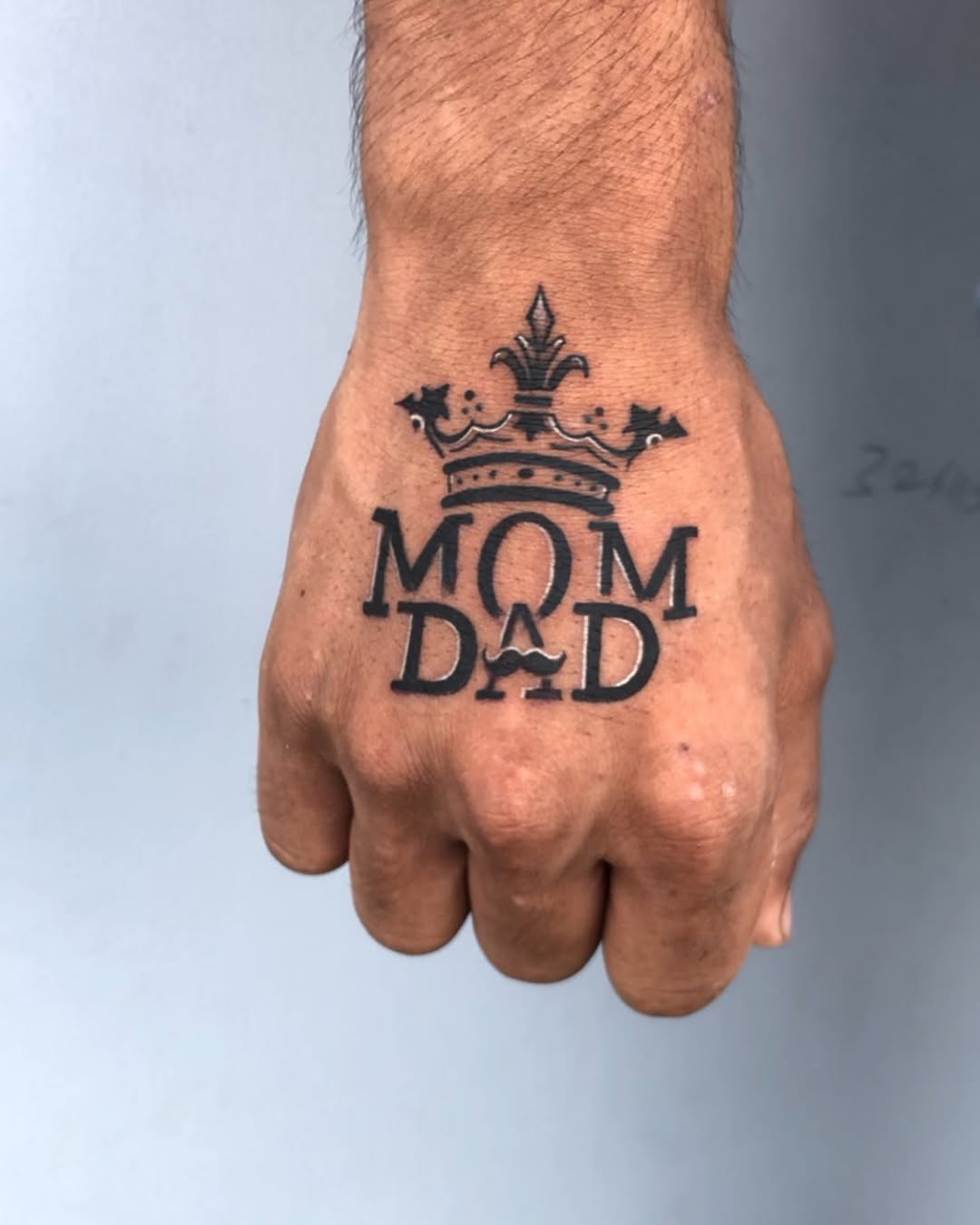 Regal Mom Dad Tattoo with Crown Design