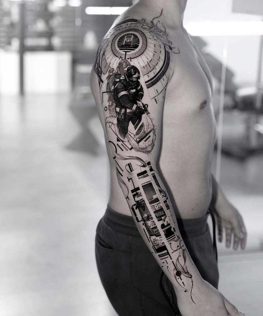 Incredible Full Arm Firefighter Tattoo Design