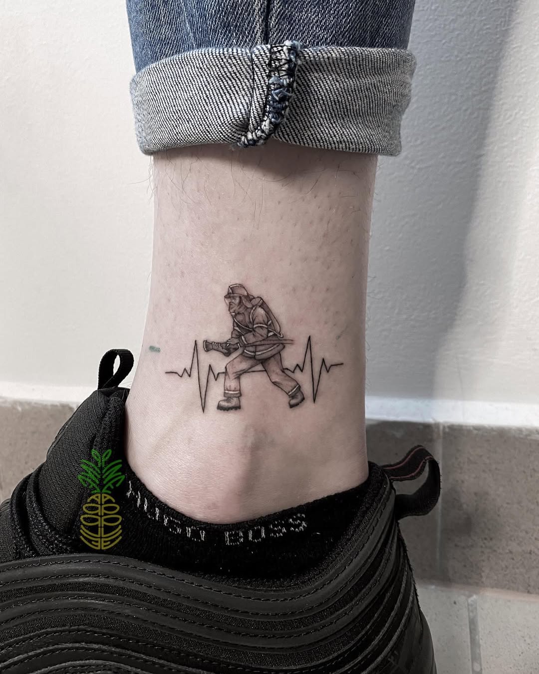 Dynamic firefighter tattoo with heartbeat line