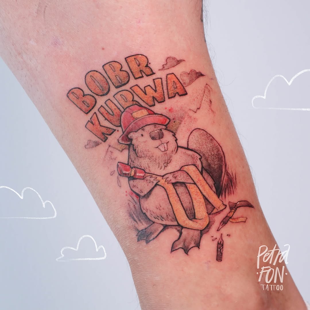 Whimsical firefighter tattoo with a playful character