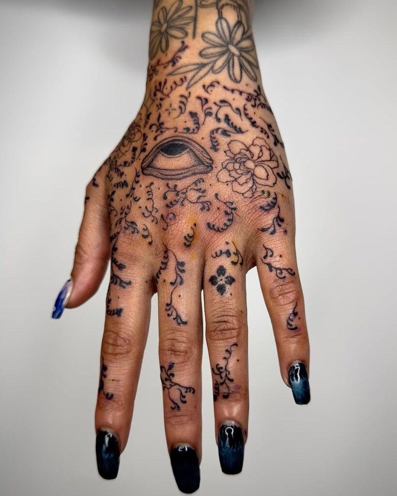 Cute And Quirky Hand Tattoo