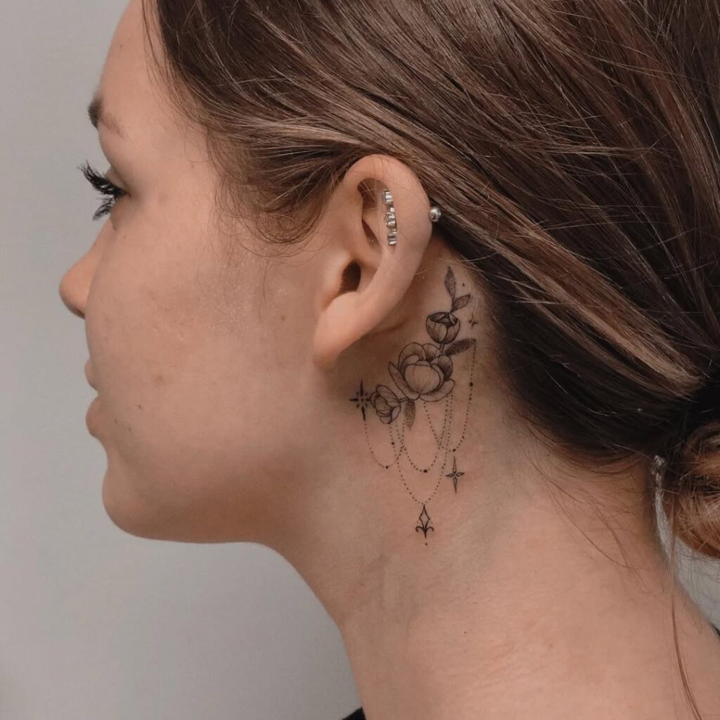 Dainty Floral Behind The Ear Tattoo