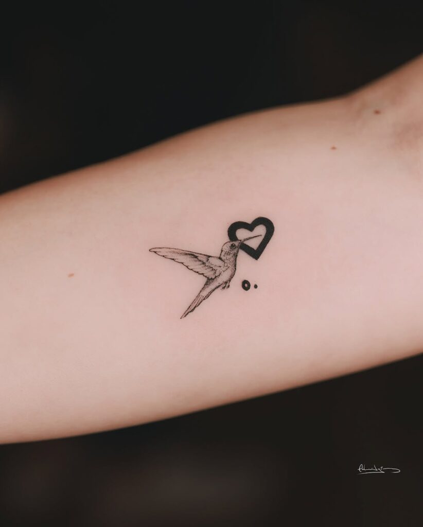 Micro Hearts And Hummingbird Tattoo