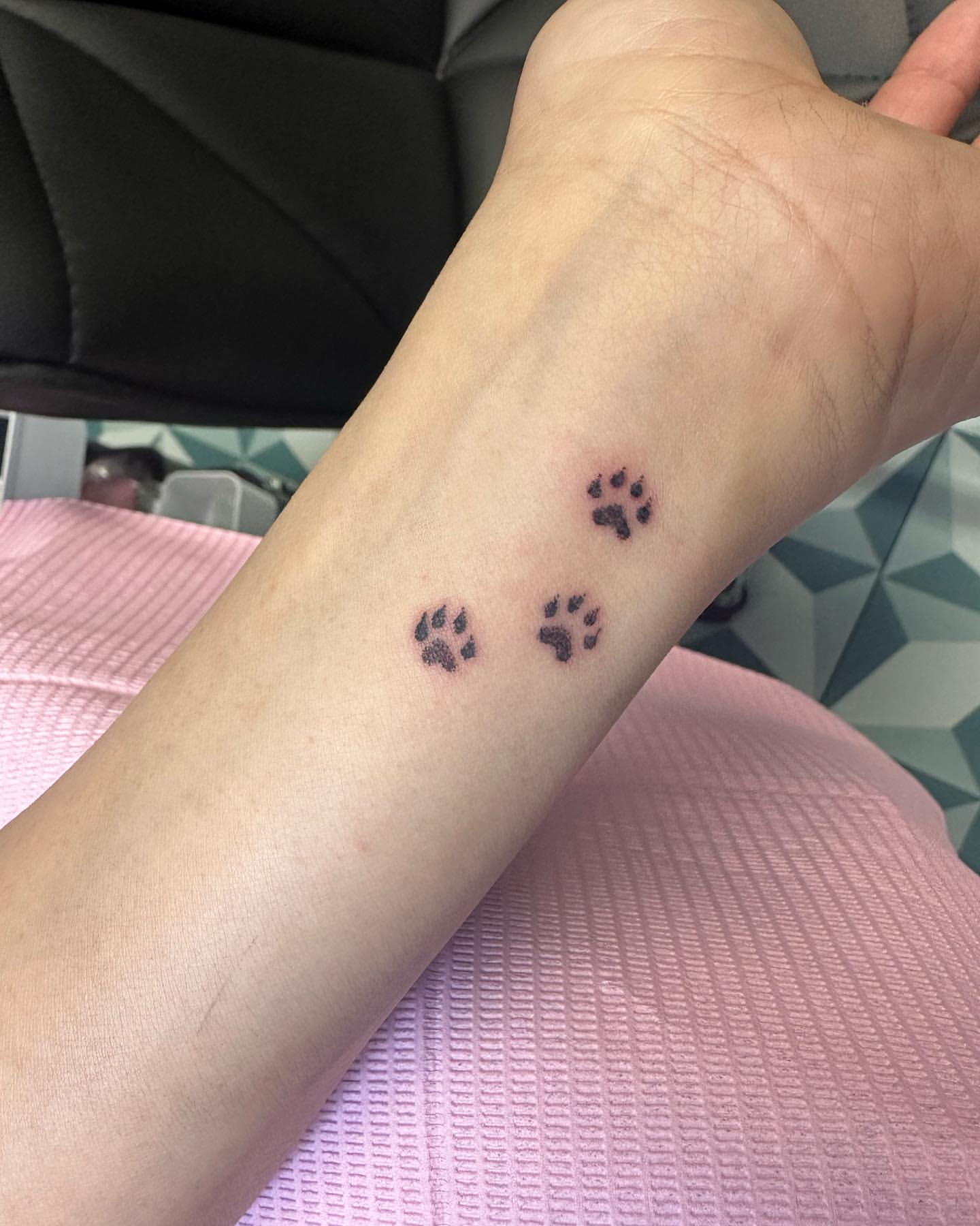 paw prints tattoo
