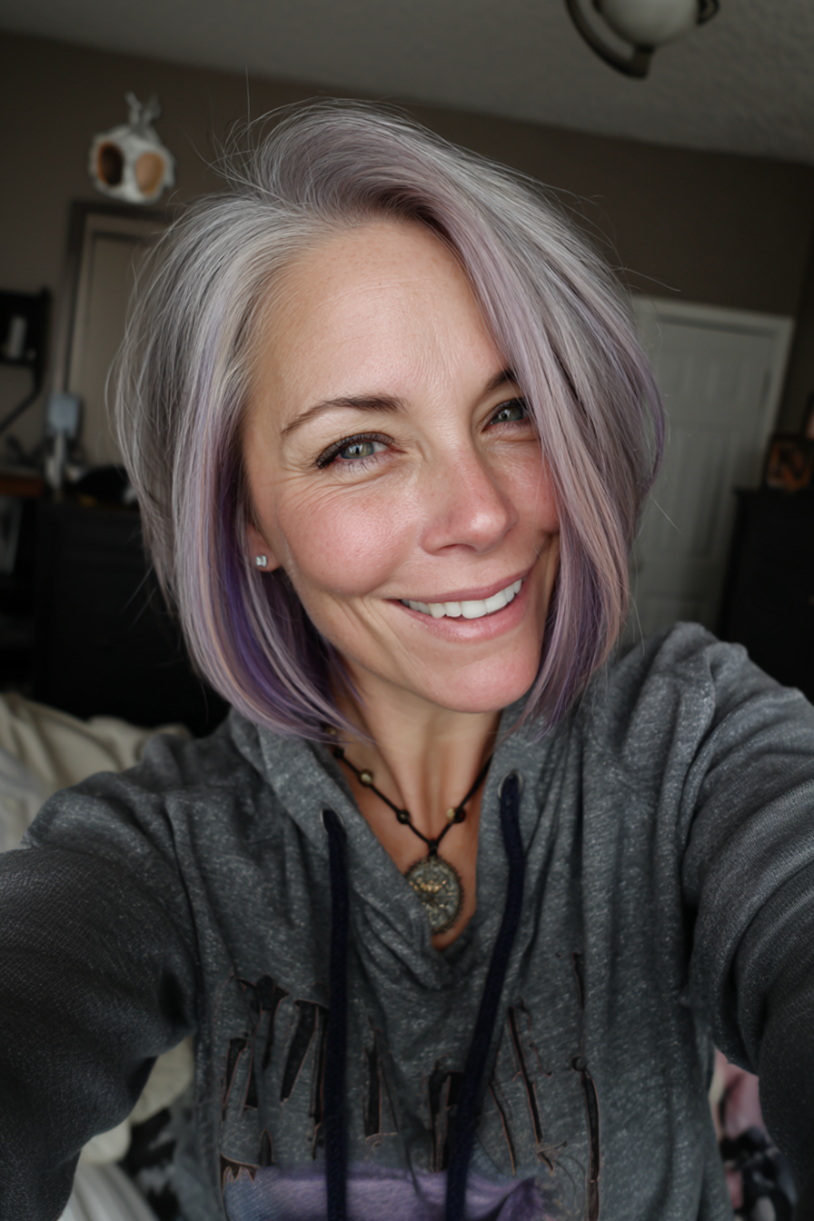 12. Sleek Angled Bob with Violet Balayage (Edgy Hairstyles For Women Over 40) - Edgy Hairstyles For Women Over 40