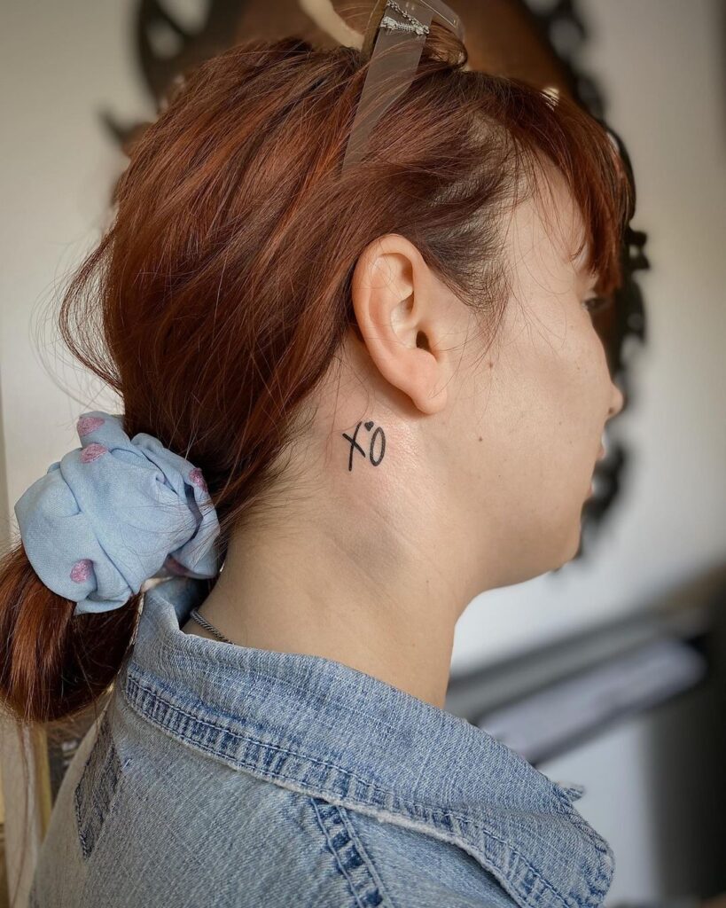 XO Behind The Ear Tattoo