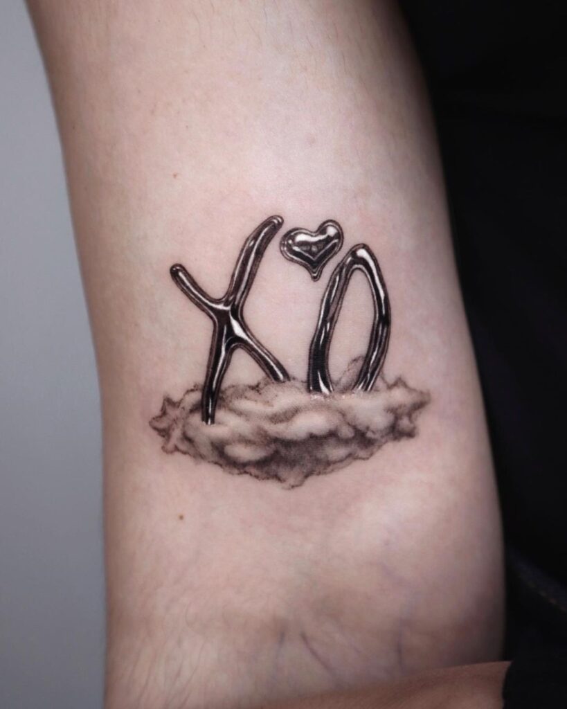 Metallic XO On The Cloud Tattoo