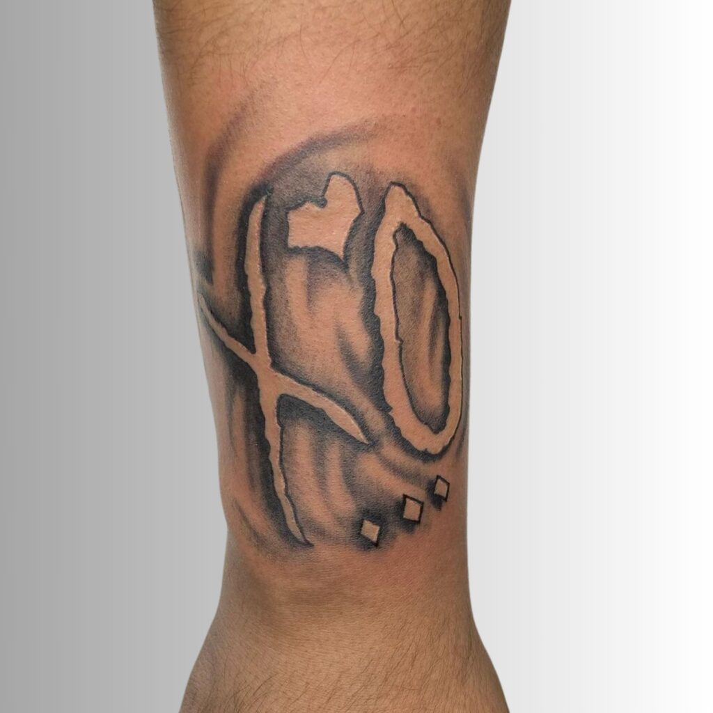 Black And Grey XO Tattoo