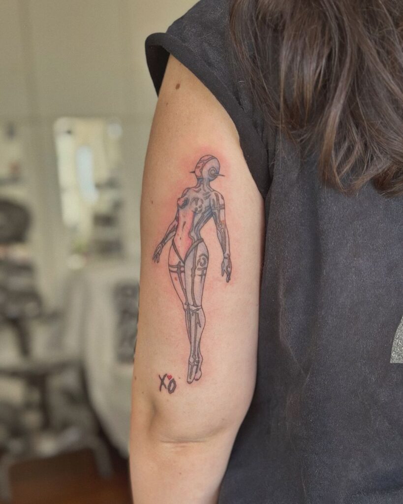 Cyber Woman And XO Tattoo