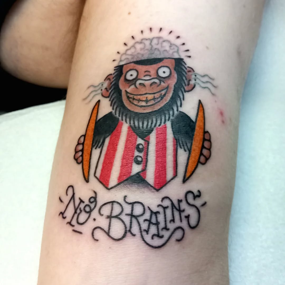 Playful monkey tattoo with a humorous twist