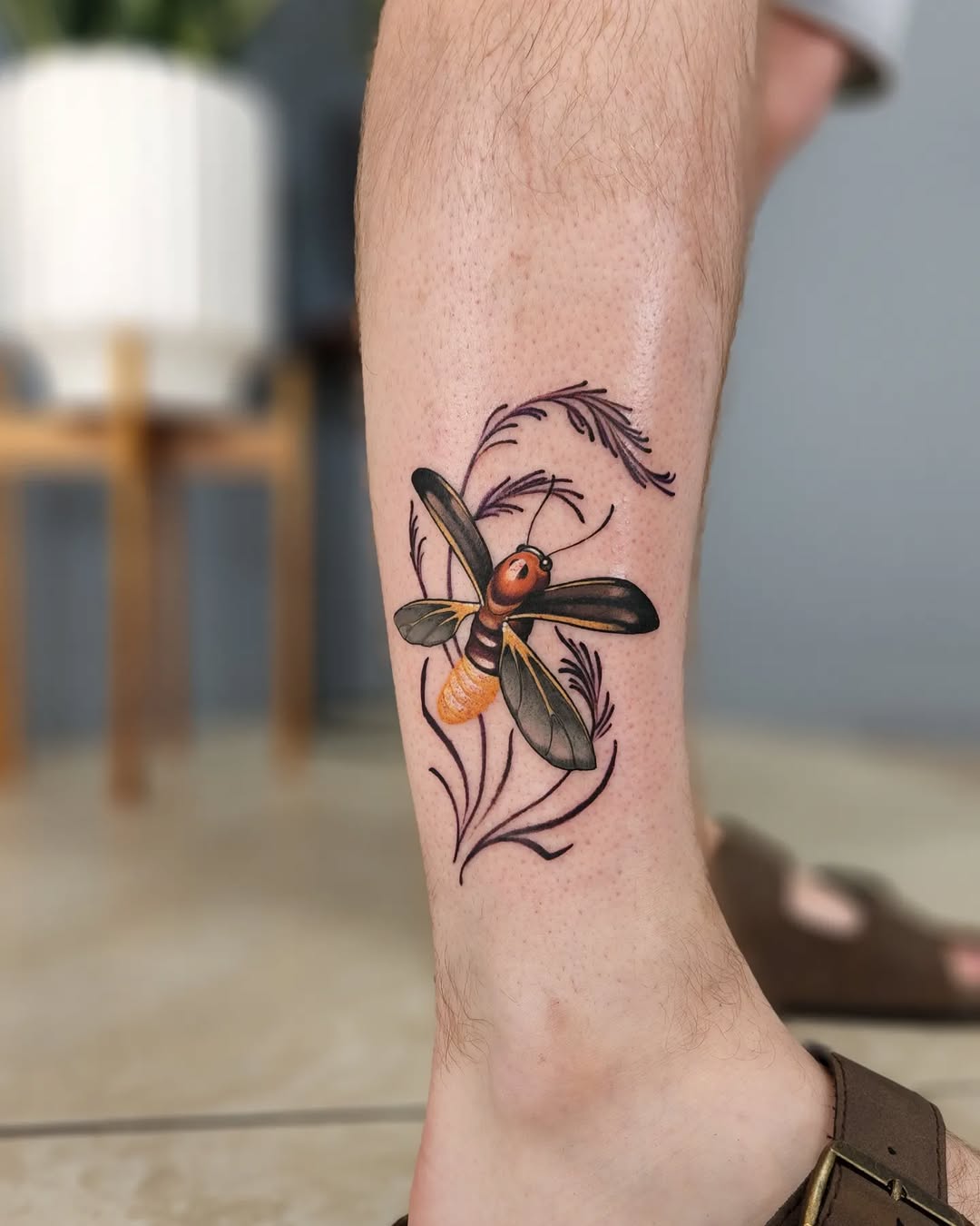 Stunning firefly tattoo bringing nature to life