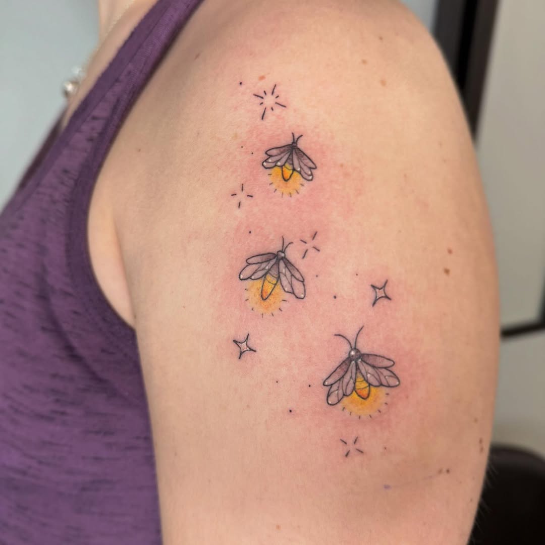Whimsical firefly tattoo highlights natural beauty