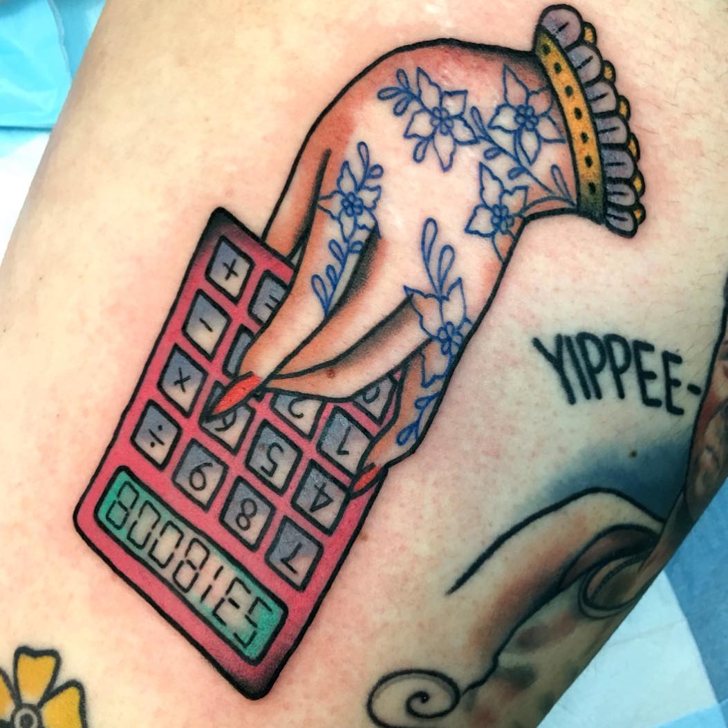 Calculator Hand Tattoo with Floral Details