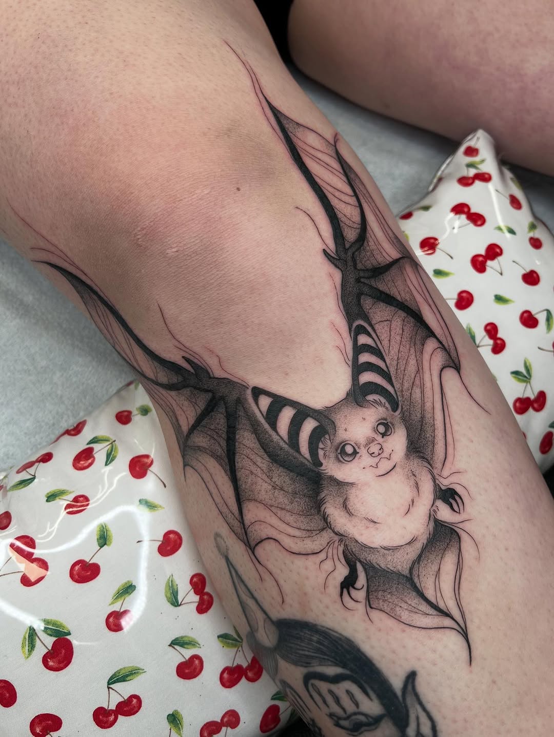 Charming and whimsical bat tattoo design