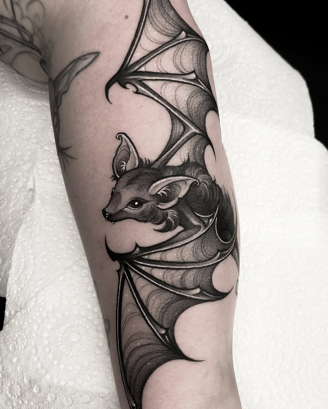 Stylish bat tattoo showcasing elegant details