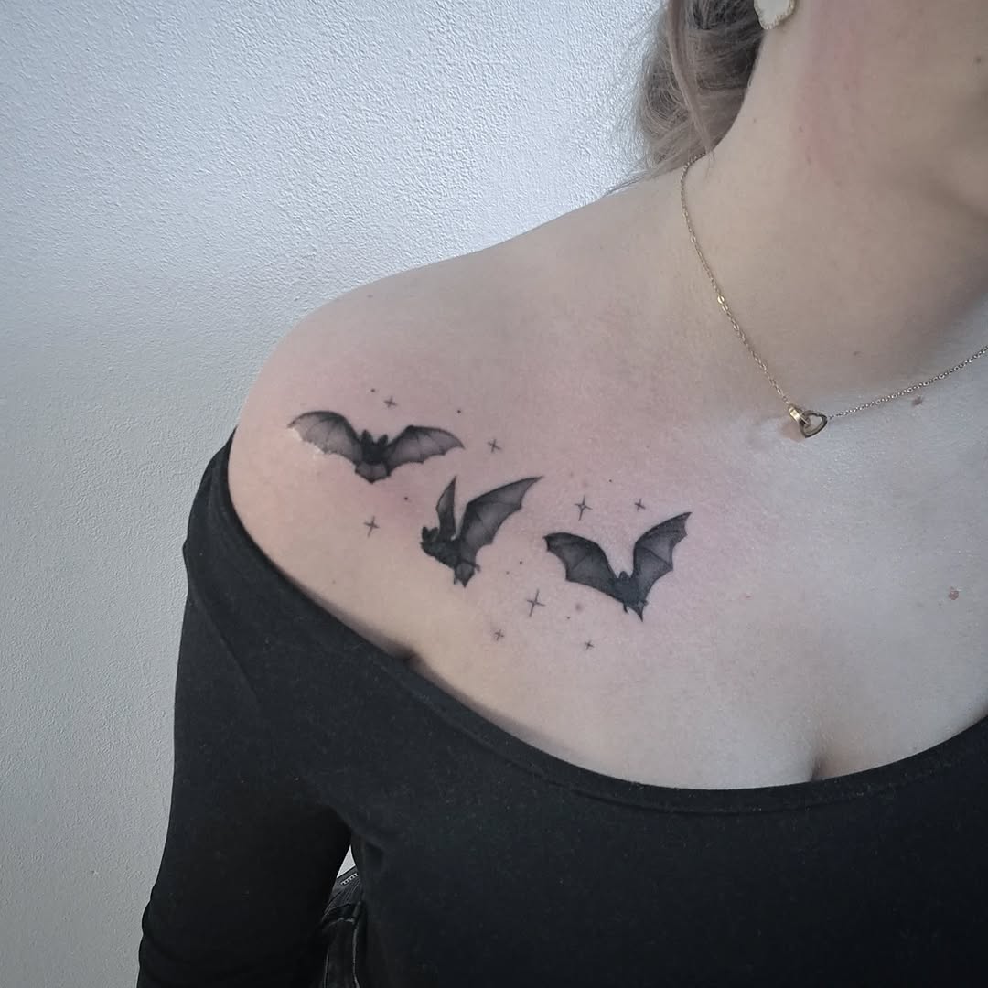 Elegant bat tattoos with celestial accents