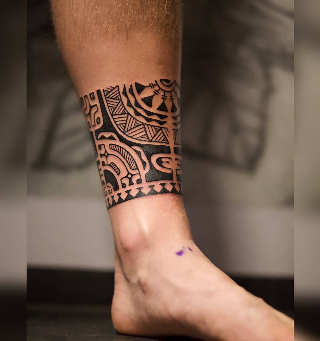Intricate Marquesan tattoo design on ankle