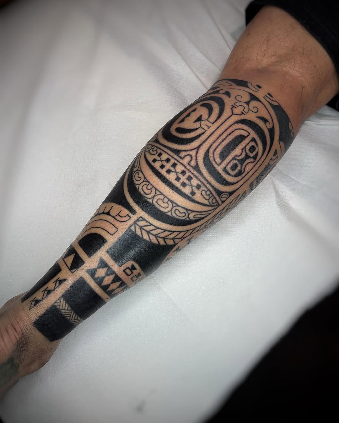 Intricate Marquesan tattoo on forearm