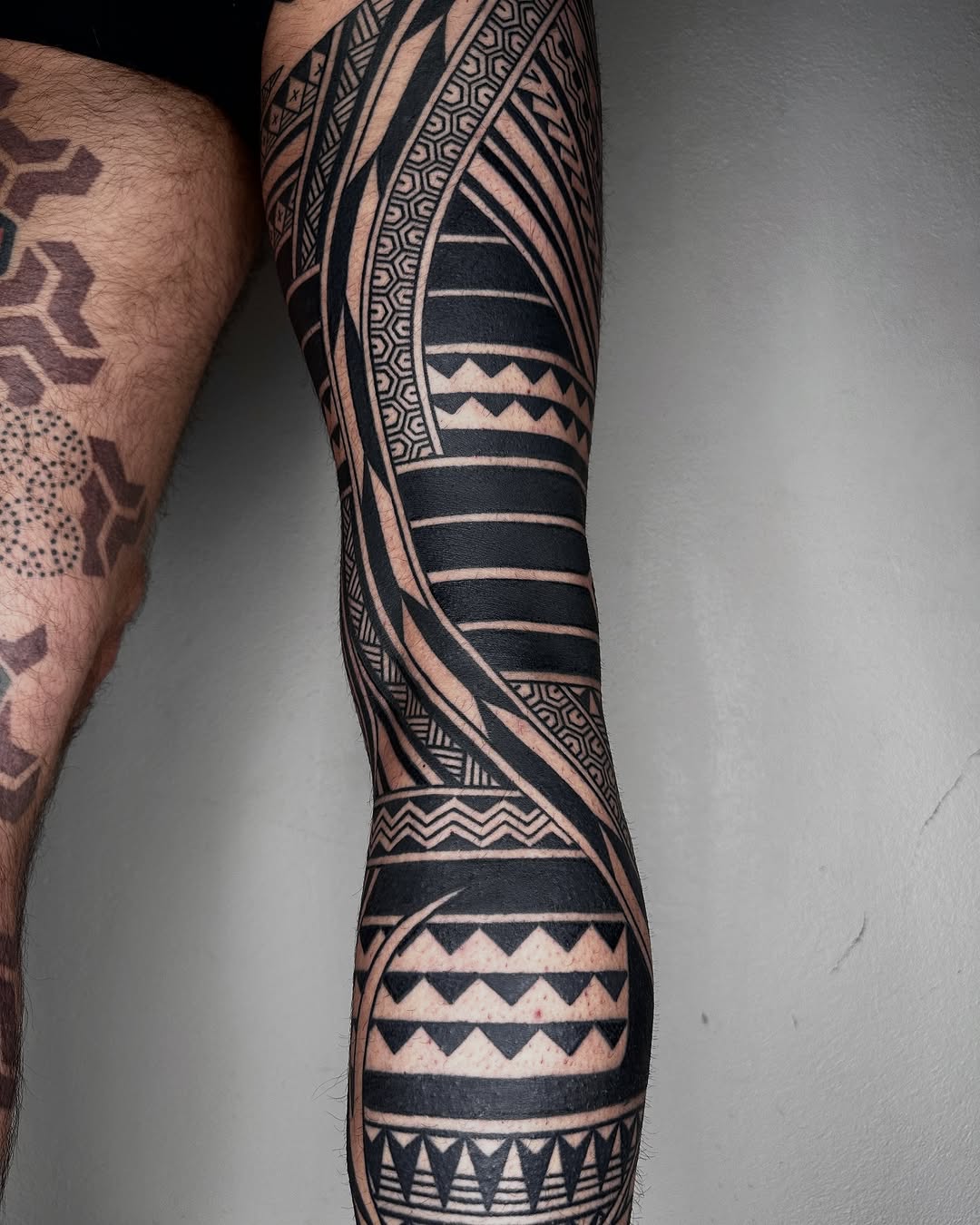 Intricate Marquesan Tattoos Adorning the Leg