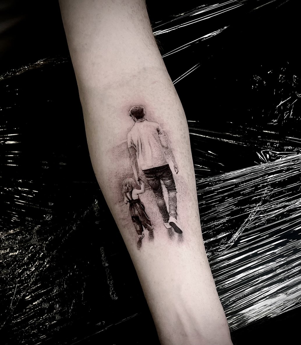 Symbolic bond between father and daughter tattoos