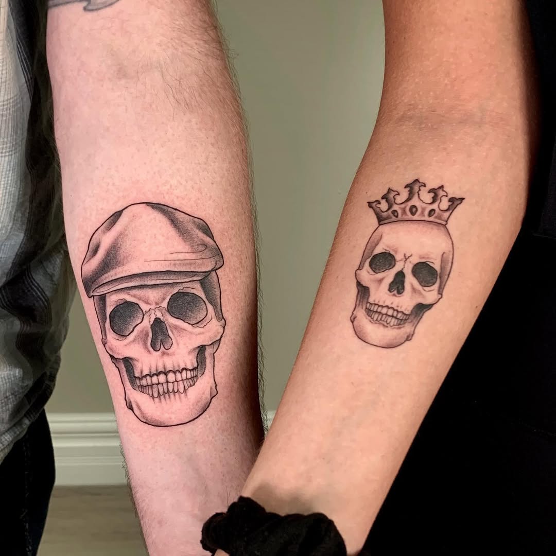 Unique father-daughter skull tattoo duo shown here
