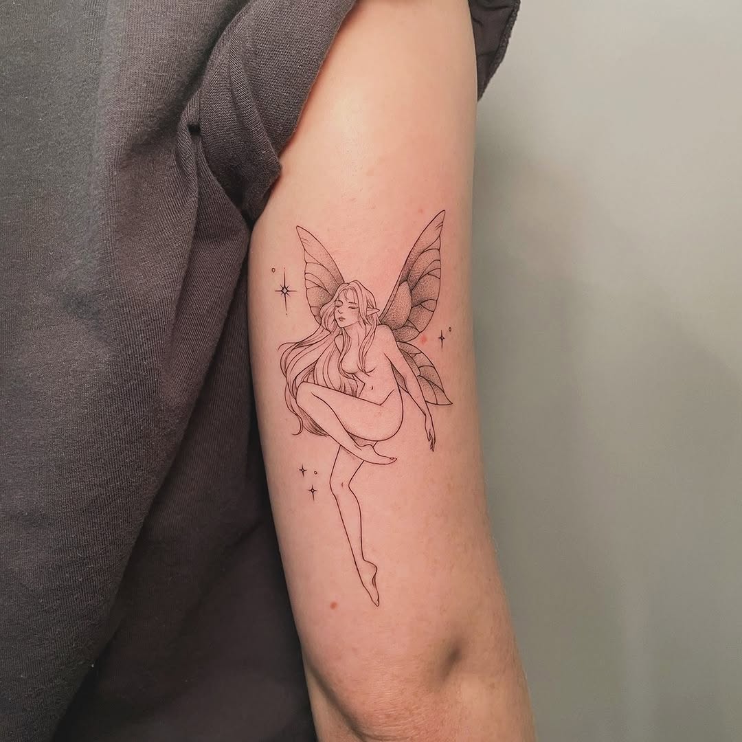 Delicate fairy tattoo showcasing ethereal beauty